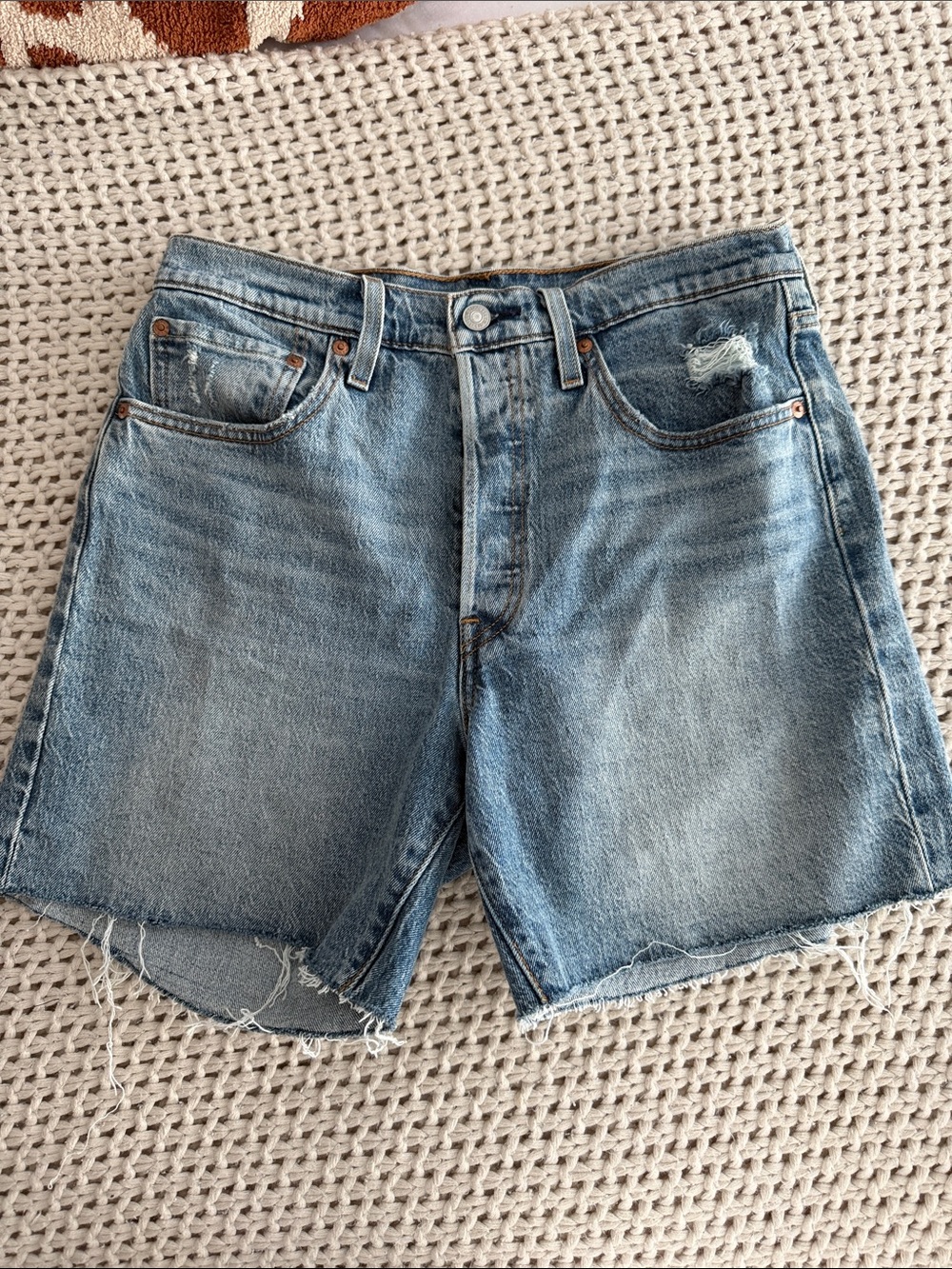 Levi’s High-Waist Distressed Light Wash Denim Shorts